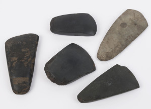 Five assorted stone adze blades, Papua New Guinea, early 20th century, ​the largest 14cm long