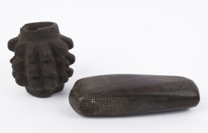 A carved stone pineapple war club head; together with a stone tapa beater, Highlands region, Papua New Guinea, early 20th century, ​10cm and 16cm long