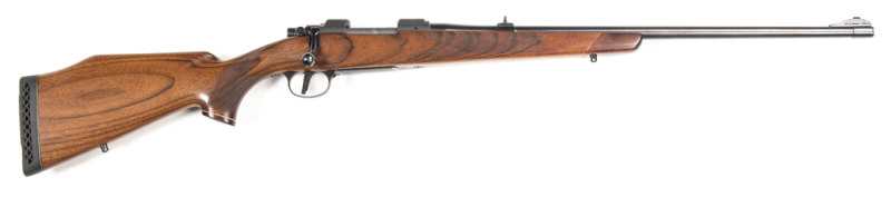 BRNO MODEL ZKK601 B/A SPORTING RIFLE: 1989; 308 Win; 5 shot; 24" barrel; exc bore; push forward set trigger; iron sights; grooved receiver; exc chequered walnut stock with pistol grip, cheek piece & rosewood caps to forend & pistol grip; with CZ rubber re