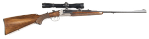J. FERLACH B.O. C/F SPORTING RIFLE: 222 Cal; s/shot; 23.75" barrel; single set trigger; g. bore; standard sights plus fitted with a German 4X32/654 scope with good optics; beautifully engraved action of foliage & deer; t/guard engraved with a mountain goa