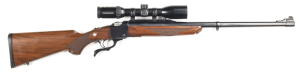 STURM RUGER NO.1 FALLING BLOCK SINGLE BARREL SPORTING RIFLE: 375 H&H Mag; 24" heavy round barrel; g. bore; standard sights & fittings; clear Ruger address to barrel & fitted with a Schmidt & Bender Zenith 1.5-6x42 scope; retaining 98% original blue finish