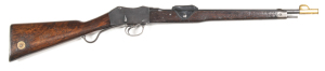 N.S.W. ISSUE MARTINI-ENFIELD MKI CAVALRY CARBINE: 303 Cal; 21" barrel; f to g bore with clear rifling; standard sights, including leather cover for rear sight; rhs of action marked V.R. ENFIELD, ROYAL CYPHER & dated 1896 M.E. 303 C.C.I.; g. profiles & cle