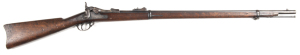 SPRINGFIELD MODEL 1873 TRAPDOOR SERVICE RIFLE: 45-70 Cal; s/shot; 32 5/8" barrel; g. bore; standard sights & fittings; U.S.MODEL 1873 to trap door; lock plate marked with an Eagle & U.S. SPRINGFIELD; U.S. marked to butt tang; g. profiles & clear markings