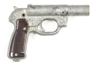 GERMAN WW11 LP 42 FLARE PISTOL: 1" bore; 6" round barrel; g. bore; WAFFENAMT stamps & WA to lhs of frame; g. profiles; galvanized steel construction; grey metal finish to barrel, frame & grip frame; P.38 type reeded brown plastic grips with lanyard ring; 