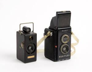 ANSCO: Memo c1927 half-frame 35mm wooden vertical box camera with leather covering; special film cassette (present) and Ilex Cinemat f6.3 40mm lens. Also, a Rediflex c1950 plastic twin-lens camera. (2 items).