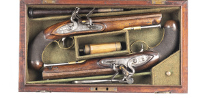 CASED PAIR OF FLINTLOCK HOLSTER PISTOLS by REA LONDON: 18 bores; 8" heavy octagonal barrels; g. bores; with small silver blade front sights & notched rear sights at the breech; top barrel flat to one pistol marked NO.91 MINORIES LONDON; the other inscrib