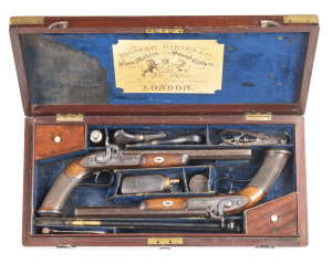 CASED PAIR OF FREDERIC BARNES & CO LONDON PERCUSSION HALF STOCKED GENTLEMAN'S PISTOLS: 50 Cal; 10" octagonal barrels with top flats marked F. BARNES & CO LONDON; f to g bores; steel pineapple finial t/guard engraved ensuite; vg profiles, clear markings &