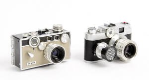 ARGUS: Argus C3 Matchmatic [1958-66] #1822814154, with maker's ERC. Also, an Argus C-forty-four-R [1958-62] #1730129182, with f2.8 50mm coated Cintagon lens and maker's ERC. (2 cameras).&nbsp;