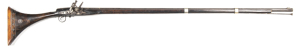 MOROCCAN SNAPHAUNCE FULL STOCKED MUSKET: 20 bore; 44" round barrel with silver inlay tulip panels at breech, some engraving, held to stock with two silver bands; notched rear sight & silver grotesque mask front sight; flat lock of type design, sliding pan