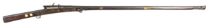 INDIAN TORADOR MATCHLOCK MUSKET: 18 bore; 48¼" 3 stage impressive fluted swamped barrel with chiselled flared muzzle & integral covered pan; enclosed serpentine lock with skeletonised trigger; full stock with 3 wide brass bands, usual splice at rear band,