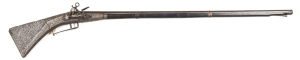 SARDINIAN MIQUELET FOWLER by BARBUTI: 32 bore; 37¼" octagonal barrel with maker's touch mark at breech, secured by two iron bands; p. bore; gwo chiselled iron lock with filed details & signed Barbuti; full stock with butt of characteristic form in g. cond