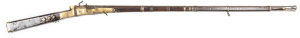 INDIAN TORADOR MATCHLOCK MUSKET: 18 bore; 48" round barrel with brown patina & silver koftgari to muzzle, mid & breech areas, with integral pan & cover; standard serpentine type lock with open trigger; side plates of polished brass; full stock with 11 ban