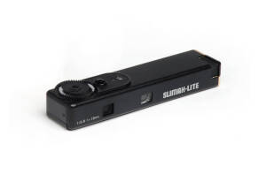 ASANUMA (Japan): Slimax-Lite, c1980s sub-miniature camera for 8x11mm exposures on Minox film (one unexposed cassette present). Incorporates a built-in gas cigarette lighter. With original satin-lined presentation box, instructions and packaging.