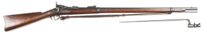 U.S. SPRINGFIELD MODEL 1873 TRAPDOOR RIFLE: 45/70 Cal; 32½" round barrel with standard sights secured with 2 solid spring bands; exc bore; lock with eagle & US SPRINGFIELD, crisp action; near original finish to lock, stock, barrel & furniture; vg full sto