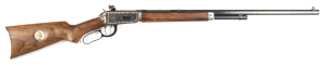 THEODORE ROOSEVELT COMMEMORATIVE WINCHESTER MOD.94 L/A RIFLE: 30-30 Cal; 6 shot mag; 26" octagonal barrel; exc bore; standard front sight, rear sight bed filled with a dovetail blank; lhs of action fitted with a Lyman peep sight; barrel marked with 2 line