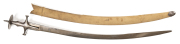 INDIAN TULWAR: vg cond 30½" watered unfullered blade, 9" back edge, some v. minor blemishes; interesting issue marks to back edge; traditional open hilt & lrg disc fully decorated with silver koftgari, incorporating inscription to disc underside; complete