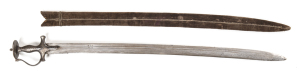 RARE REVERSE EDGE INDIAN TULWAR: vg cond 30" watered tri-fullered blade with reverse curve, 7½" back edge, Armourer's stamps near ricasso; traditional hilt with bar & disc, silver koftgari work with some wear; complete with brown velvet over wood scabbard