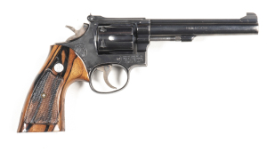 SMITH & WESSON MOD 48-4 R/F REVOLVER: 22 MRF; 6 shot fluted cylinder; vg bore; standard sights; S&W & Cal markings to barrel with Trademark, MADE IN USA & address to rhs of frame; vg profiles & clear marking; retaining 95% original blue finish to frame, b