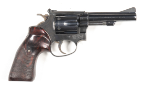 SMITH & WESSON MOD 34-1 R/F REVOLVER: 22 LR; 6 shot fluted cylinder; 102mm (4") barrel; standard sights, S&W & Cal markings to barrel; S&W Trademark to lhs of frame; MADE IN USA & address to rhs of frame; vg profiles & clear markings; retaining 98% origin