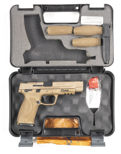 SMITH & WESSON MODEL 9 S/A PISTOL: 9mm; 10 shot mag; 121mm (4¾") barrel; exc bore; standard sights, address & Trademark to slide; exc khaki finish; sharp profiles & clear markings; pistol is "new" unfired. Comes in S&W carry box with spare mag & 3 interc