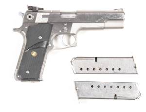 SMITH & WESSON MODEL 645 STAINLESS STEEL S/A C/F PISTOL: 45 ACP; 8 shot mag; 127mm (5") barrel; exc bore; standard sights, frame address to lhs & Trademark to rhs; vg profiles, clear address & markings; vg stainless finish with minor scratches; fitted wit