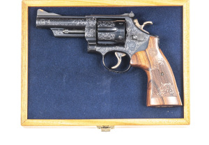 CASED & ENGRAVED SMITH & WESSON MODEL 29-Z C/F REVOLVER: 44 Magnum; 6 shot fluted cylinder; 102mm (4") barrel; exc bore; standard sights; 44 MAGNUM to rhs of barrel & SMITH & WESSON to lhs, including the S&W Trademark; rhs has MADE IN U.S.A. & S&W address