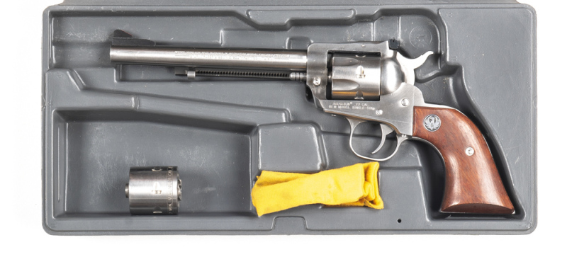 RUGER NEW MODEL STAINLESS STEEL SINGLE SIX R/F REVOLVER: 22 R/F & 22 MAG; 6 shot fluted cylinder; 165mm (6½") round barrel; exc bore; standard sights & fittings; sharp profiles & clear markings; satin stainless steel finish; blue to front & rear sights; e