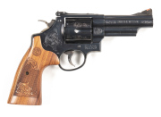 ENGRAVED SMITH & WESSON MODEL 29-10 C/F REVOLVER: 44 Magnum; 6 shot fluted cylinder; 102mm (4") barrel; exc bore; standard sights, S&W & 44 MAGNUM to barrel; MADE IN USA & S&W address to rhs of frame; tasteful small areas of foliate engraving to barrel, c