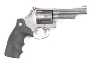 SMITH & WESSON MODEL 66 COMBAT MAGNUM STAINLESS STEEL C/F REVOLVER: 357 Magnum; 6 shot fluted cylinder; 102mm (4") barrel; vg bore; S&W & Cal markings to barrel; Trademark & MADE IN USA & address to rhs of frame; vg profiles, clear markings; lightly polis