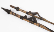 Two early spear throwers, carved wood, bamboo and natural fibre, Sepik River, Papua New Guinea, early to mid 20th century, ​the larger 105cm long - 2