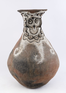 An impressive sago pot, decorated and fired clay with woven basket stand, Aibom village, Chambri Lakes, Papua New Guinea, circa 1960, ​66cm high overall