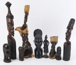 A group of nine assorted African tribal carvings, 20th century, the largest 50cm high