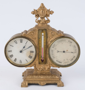 A French desk compendium clock, late 19th century. Cast iron floral decorated case with carrying finial, housing an 8 day spring driven cylinder escapement clock, aneroid barometer and alcohol thermometer. 24cm high.