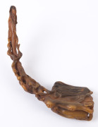 A carved horn wine cup, (19th century); together with a carved horn Ruyi sceptre with mushroom finial and Chi-Long dragon handle (19th century; as well as a carved horn sceptre adorned with leaves and peaches, (19th century), (3 items), the cup 9cm high, - 5