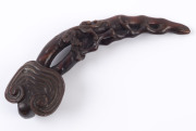 A carved horn wine cup, (19th century); together with a carved horn Ruyi sceptre with mushroom finial and Chi-Long dragon handle (19th century; as well as a carved horn sceptre adorned with leaves and peaches, (19th century), (3 items), the cup 9cm high, - 10