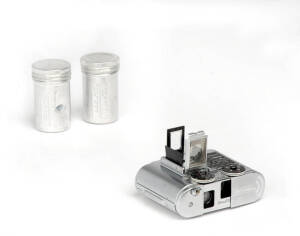 CONCAVA (Switzerland): Tessina L 35mm miniature camera in chrome [#865402], with pop-up finder in black leather case. With 2 film cassettes in aluminium cans.