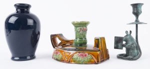 A blue glazed earthenware vase, a glazed "Majolica style" candlestick stand and match box stand with applied floral decoration, and a green patinated bronze candlestick stand with cast mouse figure reading a book, 1950's and later, (3 items), the vase 15c