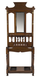 An antique English oak hallstand with bevelled mirror back and lift-top storage compartment, early 20th century, ​203cm high, 84cm wide, 28cm deep