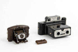 CORONET: Vogue, 1936, brown bakelite-bodied folding camera; together with 2 Vogue filters in tiny leather pouch in original box. (2 items).