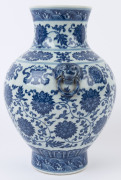 A Chinese baluster shaped blue and white porcelain vase with lotus pattern and Buddhist emblems, Qing Dynasty 19th/20th century, six character Qianlong mark to base, 31cm high - 6