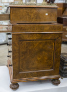 GILLOWS antique English burr walnut Davenport, handsomely fitted with pull-front writing slope, stationary drawer, ink and pen drawer and book rest slide. Original Bramah locks and keys with Gillows' signature melon feet with sunken casters. Stamped "GILL - 7