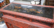 An antique Japanese red lacquered cabinet, profusely decorated on all sides. 18th century. 117cm high, 82cm wide, 34cm wide. PROVENANCE: Purchased from Spink & Son Ltd. London in 1927 for £200. formerly part of the Anderson Collection, England. - 6