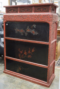 An antique Japanese red lacquered cabinet, profusely decorated on all sides. 18th century. 117cm high, 82cm wide, 34cm wide. PROVENANCE: Purchased from Spink & Son Ltd. London in 1927 for £200. formerly part of the Anderson Collection, England. - 11