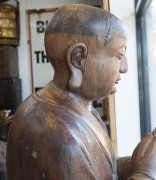 A LOHAN tall standing Chinese figure, carved and painted wood with inset glass eyes, Suzhou, Jiangsu, Ming Dynasty. 182cm high. Note: Exhibited at The Art Gallery of South Australia "AWAKENING THE ART OF BUDDHISM", Dec. 2016 to Oct. 2017. PROVENANCE: The - 2