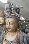 GUANYIN antique Chinese statue seated on a tree stump, carved wood with polychrome finish and insert glass eyes, Ming Dynasty, Wan-Li period 16/17th century, ​121cm high. PROVENANCE: The Judith Heaven an the late Barrie Heaven collection, South Australia. - 2