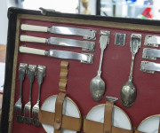 A stunning early automotive picnic set by "EDWARDS & SONS, REGENT STREET, LONDON", early 20th century, comprising stainless steel, enamel and silver plated cutlery, cannisters, warmers, containers etc., the case 62cm wide - 2