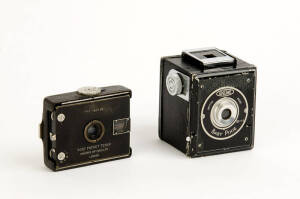 GOERZ (Austria): Vest Pocket Tenax (plate type), 1908, strut-type folding camera for 4.5x6cm plates; engraved for English seller. Also, a GNOME Baby Pixie box camera c1950. (2 cameras).