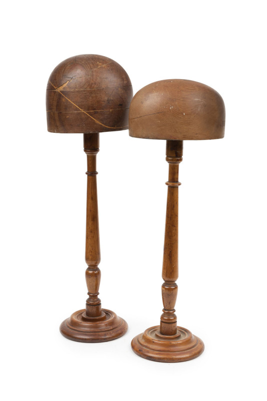 Two huon pine shop display hat stands, 19th century, 56cm and 60cm high