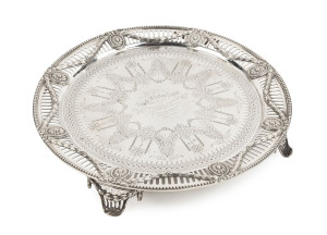 MALLEE VICTORIA INTEREST. A fine antique sterling silver tray on four raised and pierced feet decorated with garlands, engraved "Presented With Claret Jug To DONALD McLELLAN ESQUIRE Of Cove Victoria By Residents In The MALLEE and TATIARA Districts As A Token Of Their High Esteem For Him, A Friend And Neighbour. BORDER TOWN, July 15th, 1874". Made by Daniel & Charles Houle of London, circa 1867. 31.5cm diameter, 1205 grams.