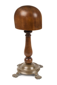 An antique huon pine and brass hat block, 19th century, stamped "GODFREY, MELBOURNE", 46cm high